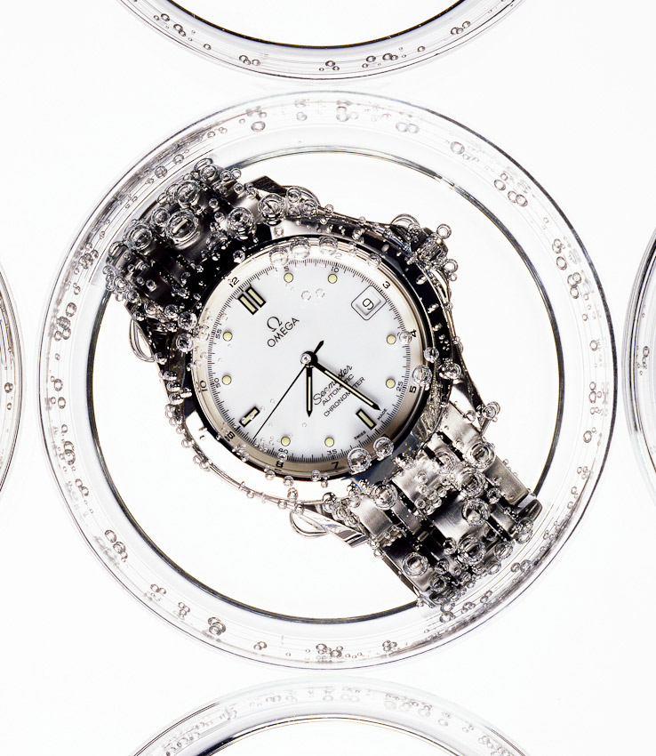 Omega watch, underwater, bubbles, still-life, still-life photographer, still-life photography, still-life photographer London, mens accessories still life, watches photography, product photography, watches photographer, Advertising photographer, Advertising still life photographer, commercial photographer, David Parfitt