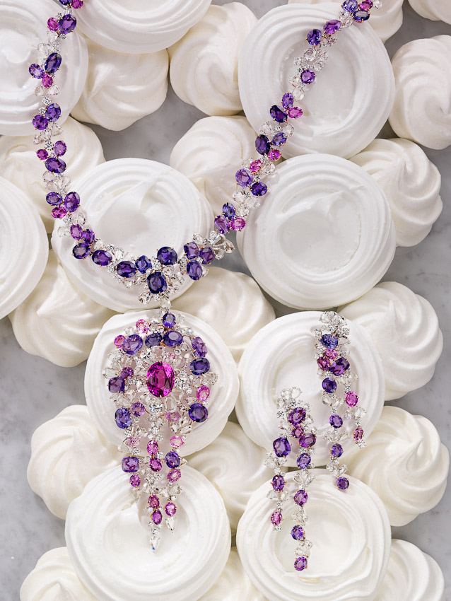 Moussaieff Jewellers, precious purple stones, Necklace and earrings laid out on white meringues, still-life photographer, still-life photography, still-life photographer London,  jewellery photographer, jewelry photographer jewellery photography, Tatler promotions, Tatler photographer, David Parfitt
